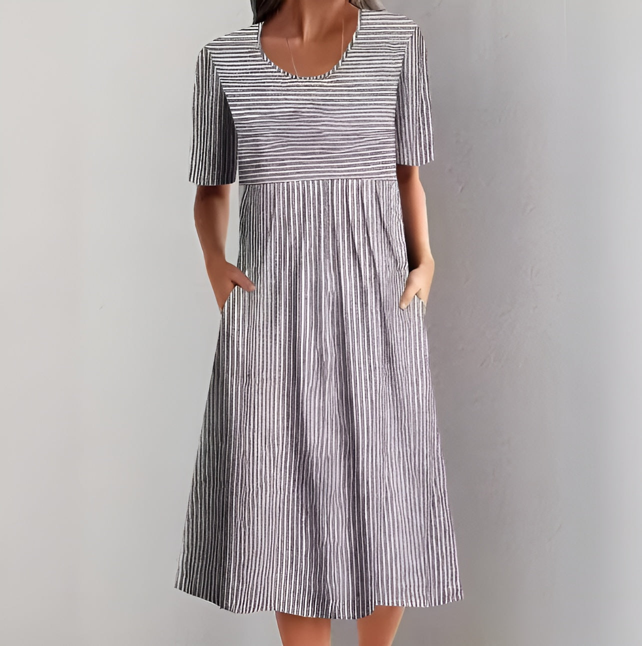 ALMA | Elegant randig midiklänning